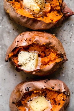 Baked Sweet Potatoes in the oven are so easy and come out perfectly sweet and fluffy on the inside with this foolproof recipe.