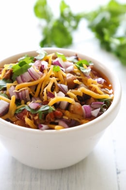 This easy turkey chili recipe uses lean ground turkey and a whole lotta beans! Make this in the slow cooker or Instant Pot, then pile on your favorite chili toppings and enjoy!